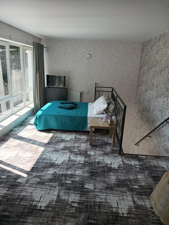 Двухэтажная квартира с панорамными окнами