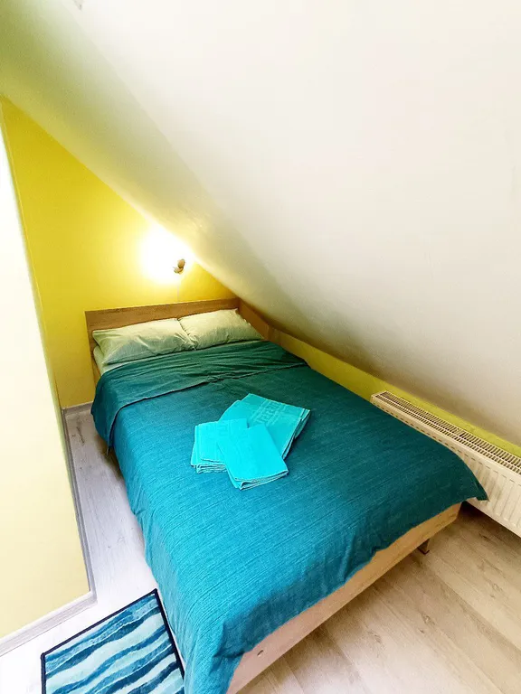 Квартира Стандартный двухместный номер с мансардным окном — аренда посуточно в Нижний Новгород