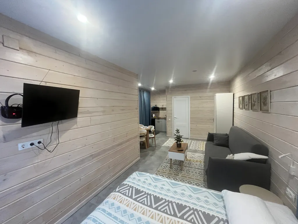 Уютная комната с выходом на террасу