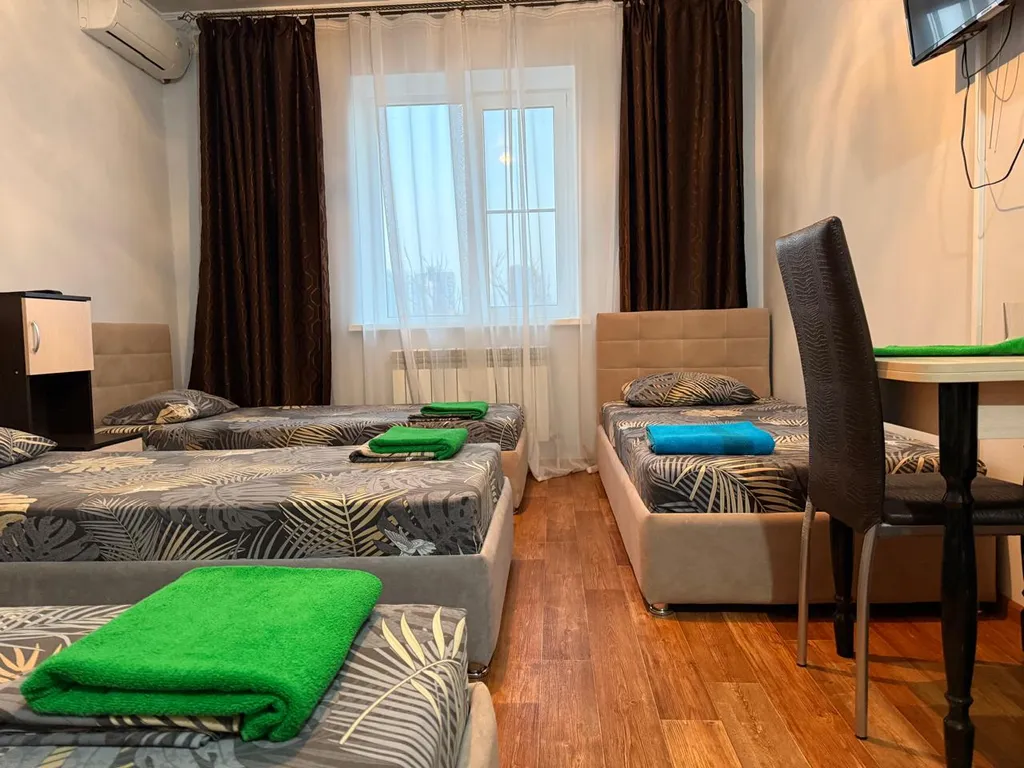 Четырехместный номер с 4-мя односпальными кроватями