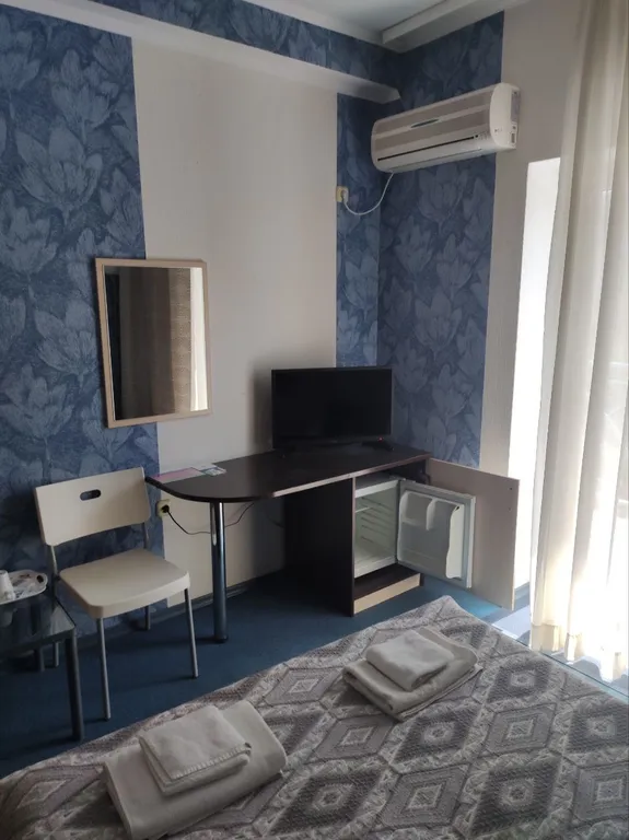 Номер на пятом этаже с видом на горы