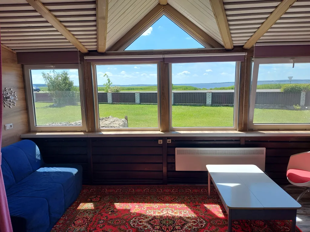 Уютный семейный коттедж с прекрасным видом на озеро Дривяты — аренда посуточно в Браслав