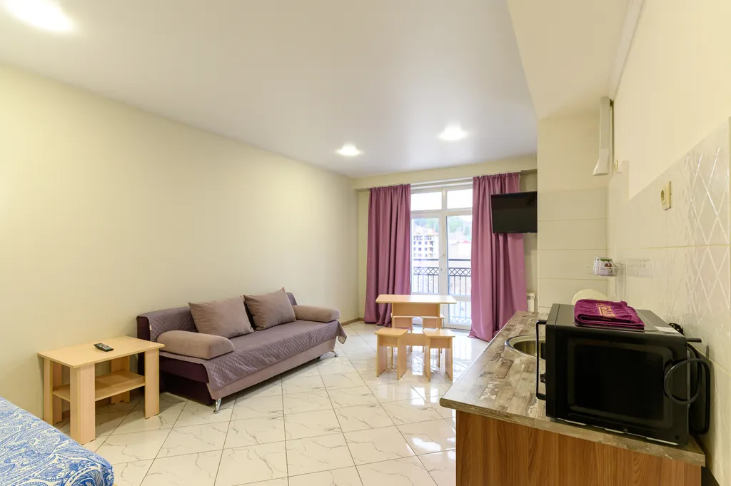 Апартаменты с видом на горы в центре города