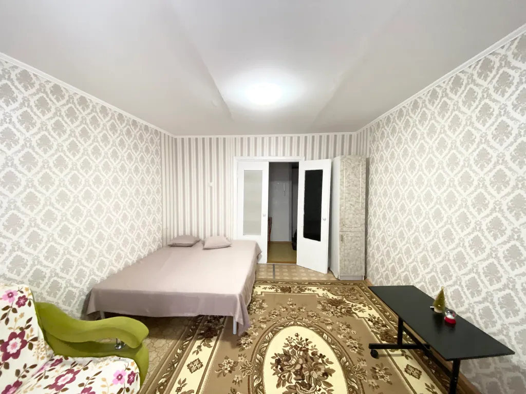 Квартира Уютная двухкомнатная квартира в Нефтяниках — Омск