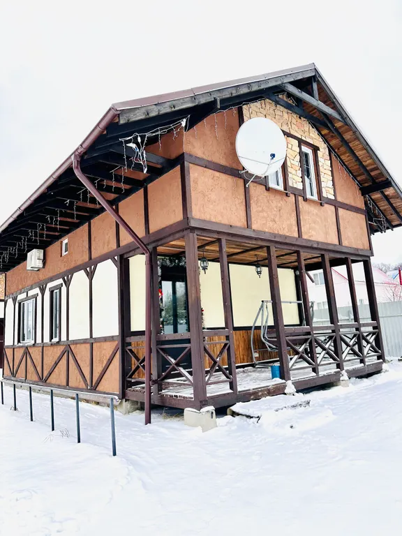 Уютный коттедж с дизайнерской отделкой и сауной