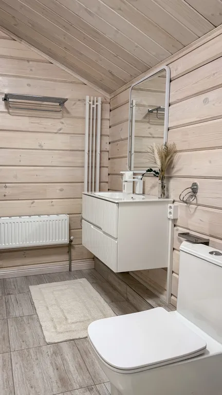 Двухэтажный коттедж в сосновом бору