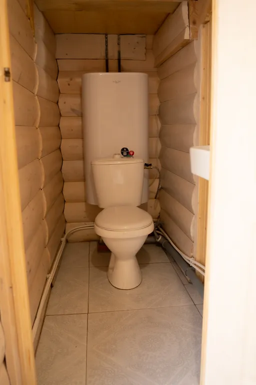 Двухэтажный срубовый гостевой домик с русской баней на дровах и купель