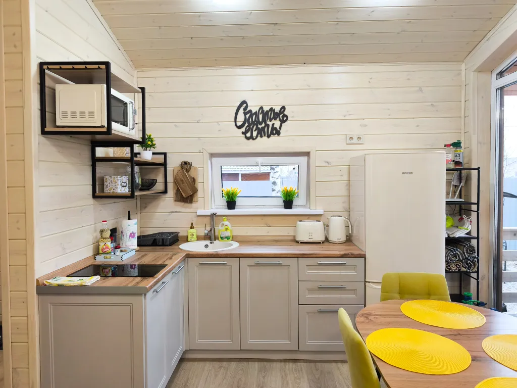 Дом шале с горячей купелью на террасе