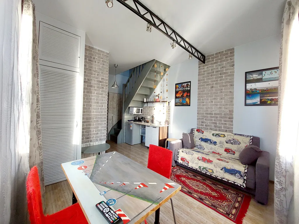 Двухуровневая квартира с выходом в сад