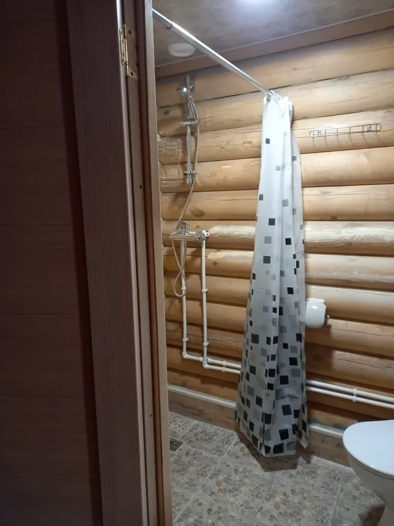 Домик из сосны в городе  С.