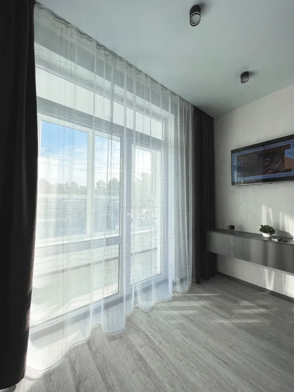 Новый апартамент с видом на лес