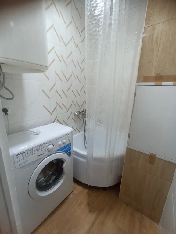 Квартира со своим двориком и стоянкой