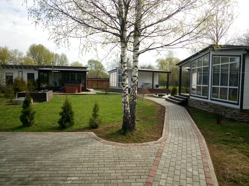 Уютный коттедж с баней и подогреваемой купелью.