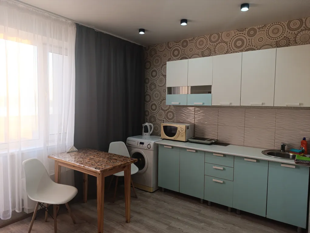 Уютная студия с видом на пруд