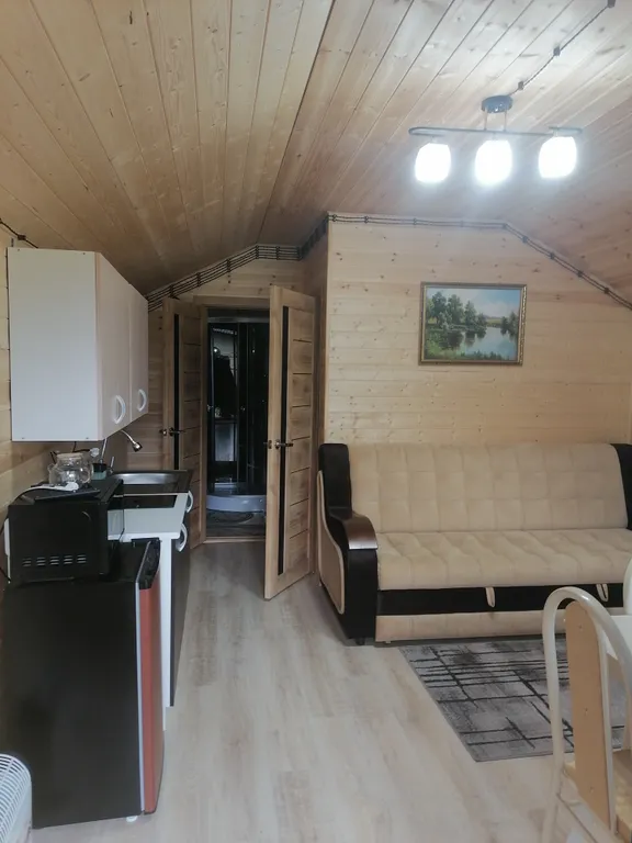 Барнхаус с видом из панорамных окон на красивый пейзаж Домбайских гор