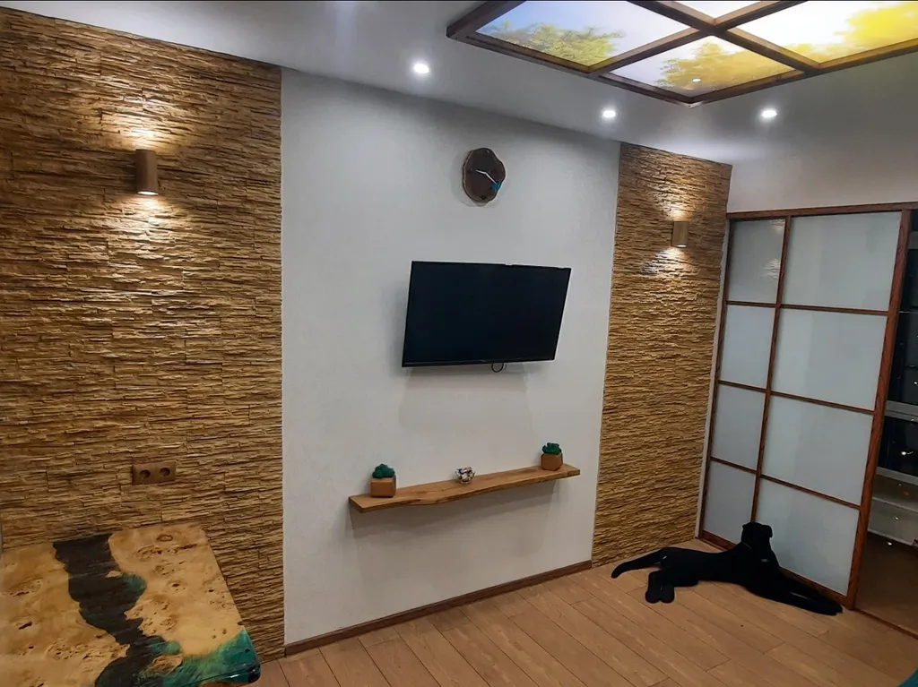 Апартамент с лаундж-зоной в экодизайне в центре города