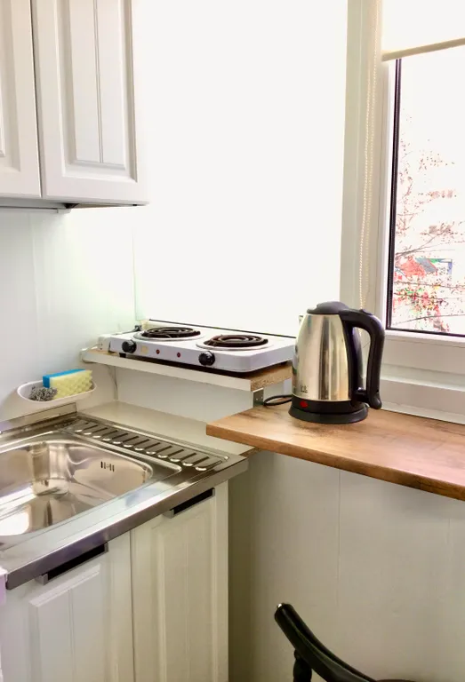 Студия с кухней в центре