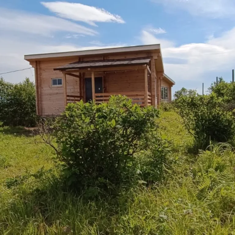 Дома для отдыха "Ипиней" С видами на домашние вулканы, город, бухту