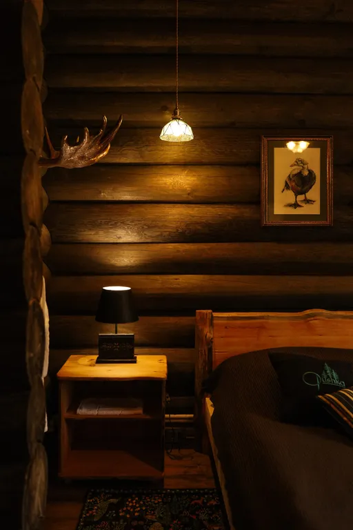 Бревенчатый дом-баня в стиле охотничьего домика