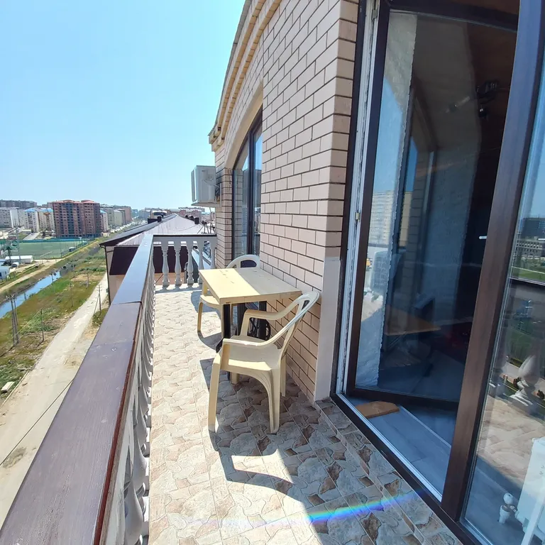 Квартира с балконом на высоте птичьего полета