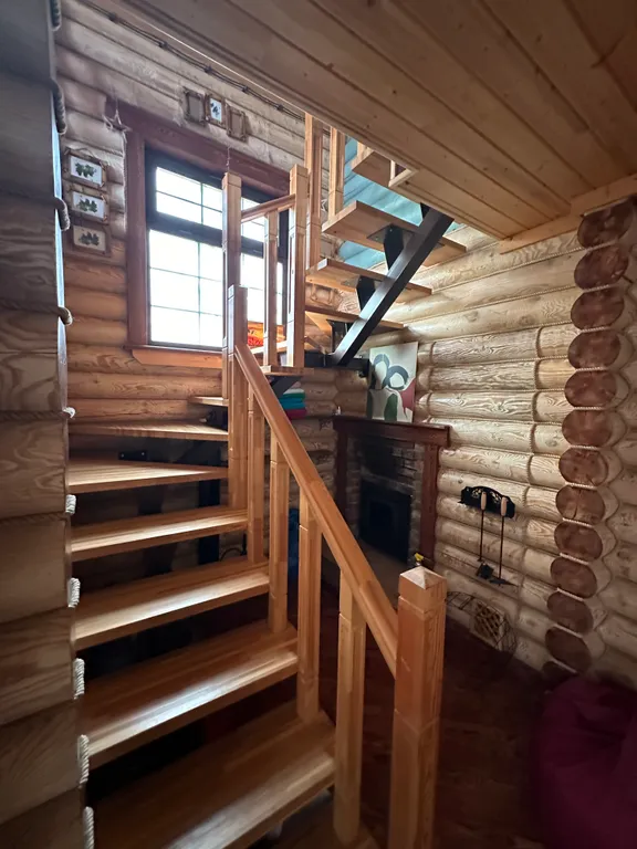 Дом из бруса на берегу моря с зоной барбекю и собственной парной