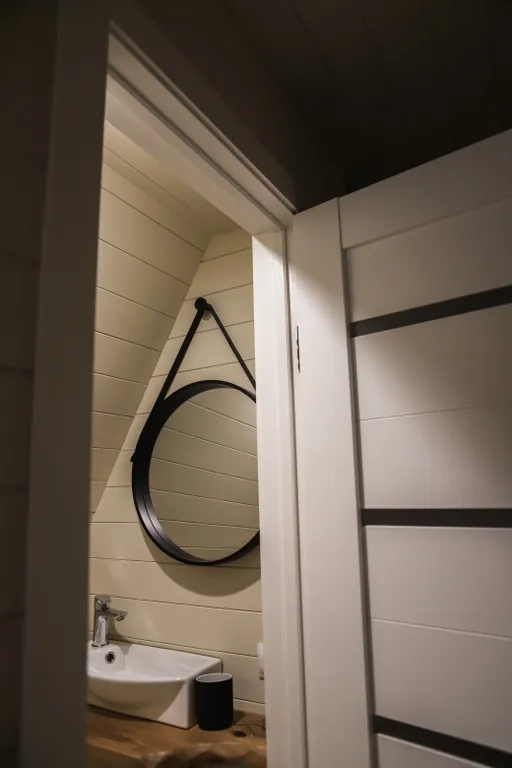 Нескучный треугольный дом Mökki с купелью