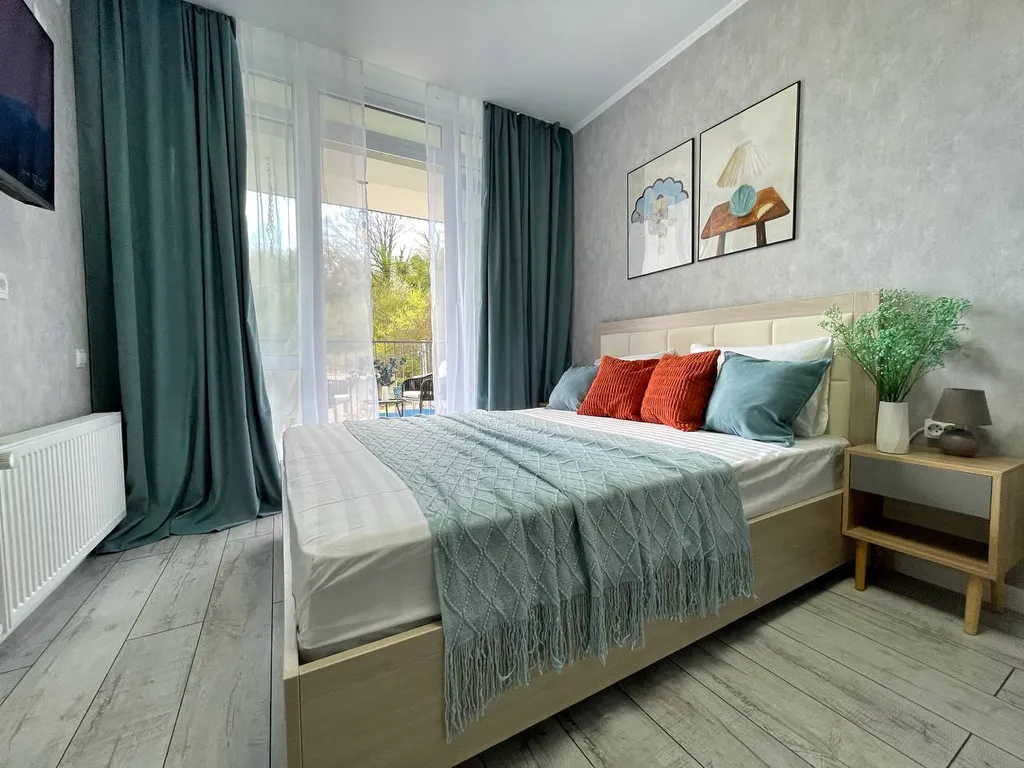 Апартаменты для двоих с большим балконом