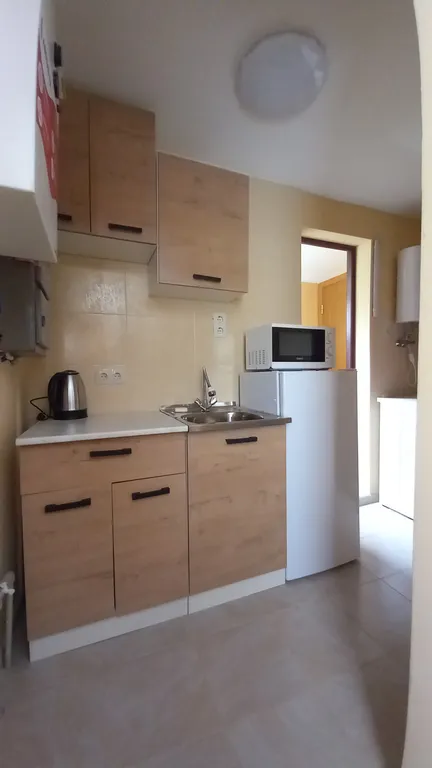 Уютный домик с местом для велосипеда