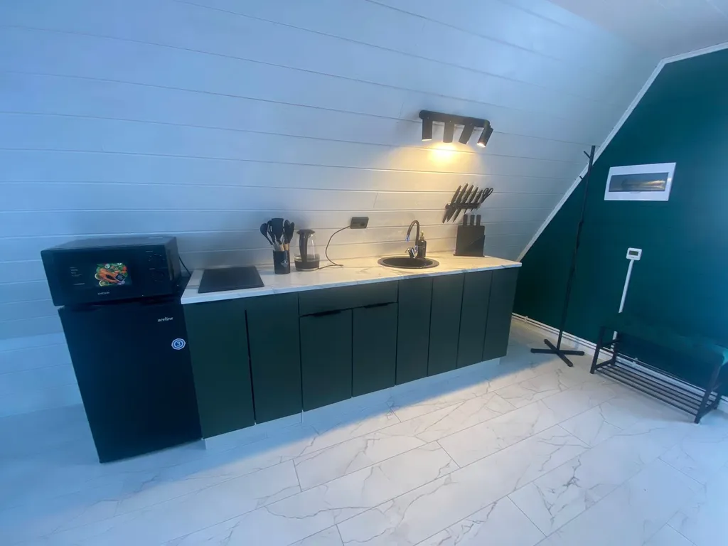 Дом A-frame с сибирским чаном на бревнах