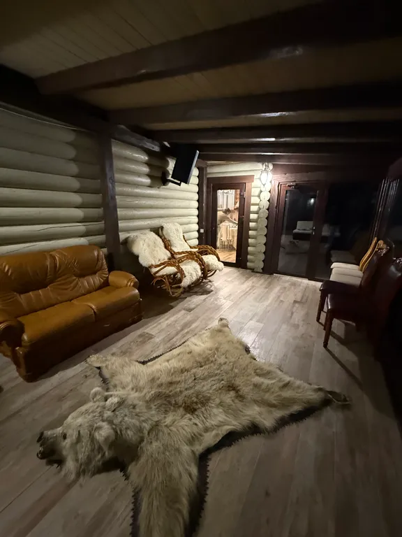 Двухэтажный дом из сруба а Теберде с баней с видом на горы и реку