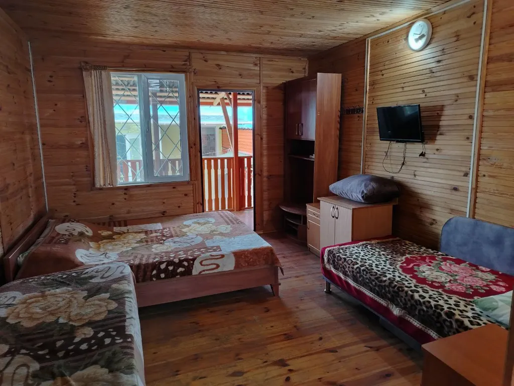 Экологичный деревянный коттедж в можжевеловой роще