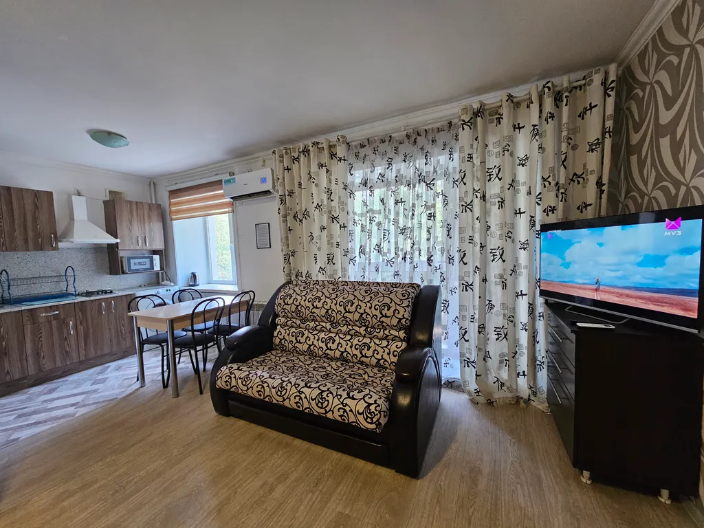 Уютная 2-комнатная студия для семей с детьми в центре города