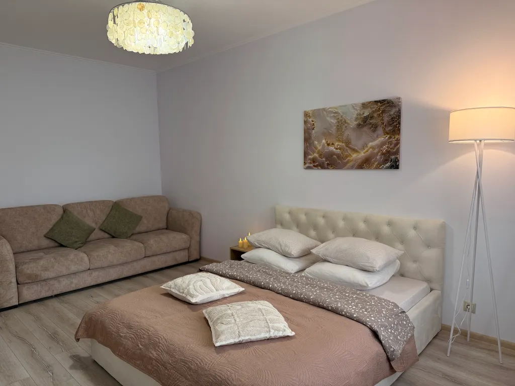 Уютная квартира с роскошной кроватью