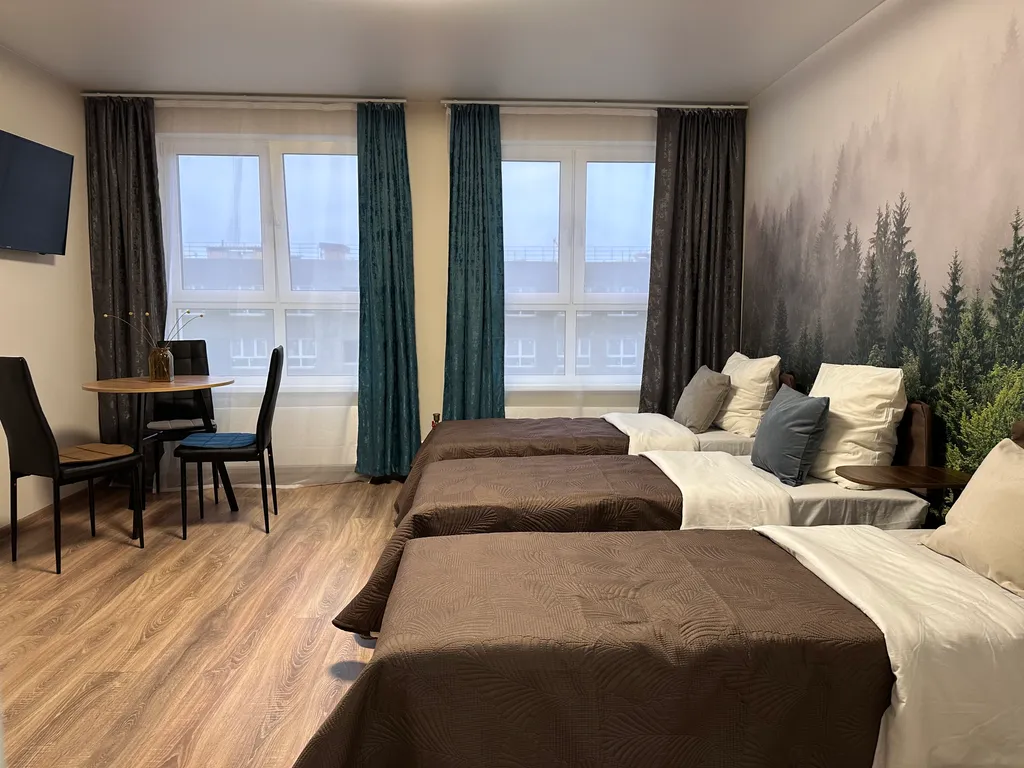 Студия с тремя раздельными кроватями