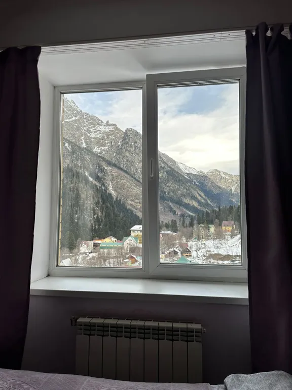 Уютная студия в самом сердце Домбая с видом на горы