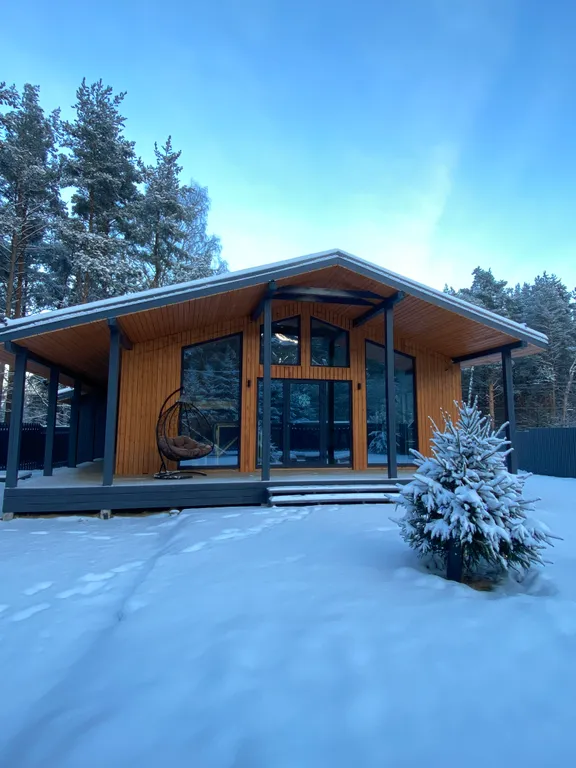 Коттедж Уютный коттедж с сауной и купелью — Бугры