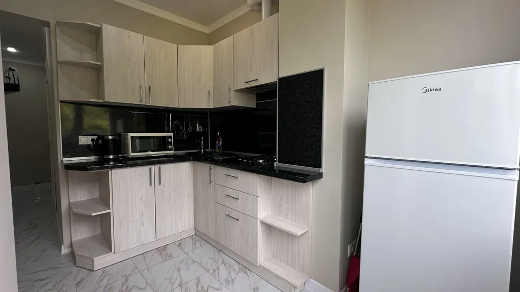 Апартаменты класса люкс с видом на море и горы в центре города