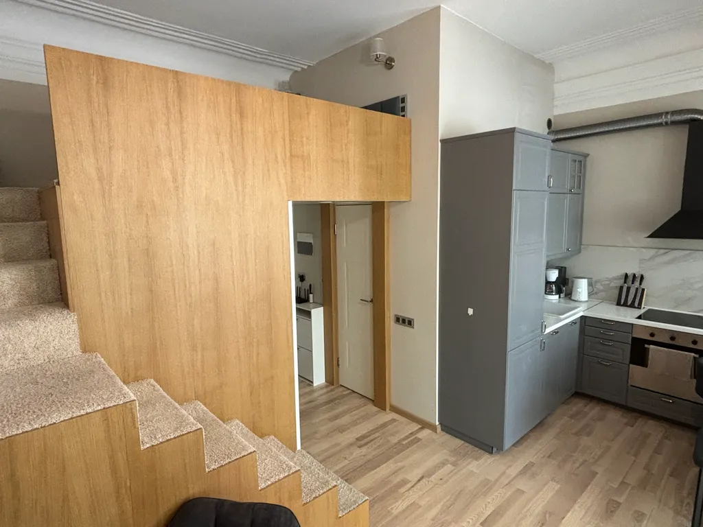 Современная двухуровневая квартира в самом центре города