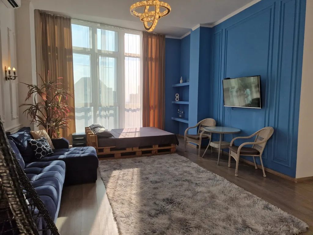 Современные апартаменты с террасой и видом на горы