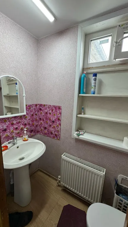 Дом-квартира с мансардой в центре