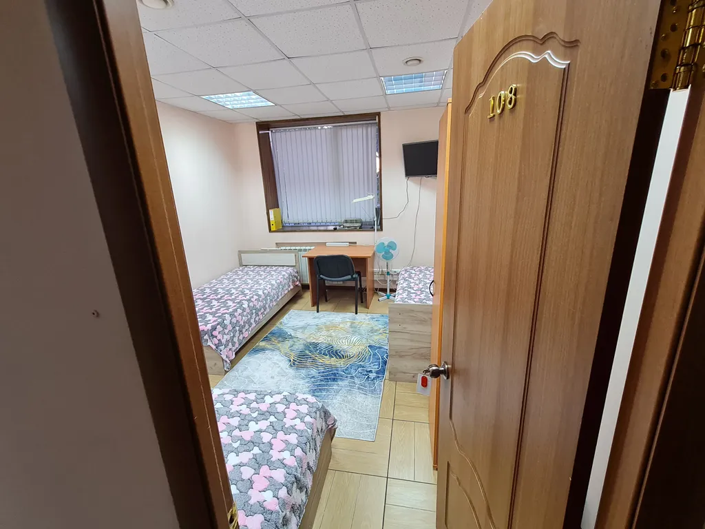 Трёхместный номер с односпальными кроватями