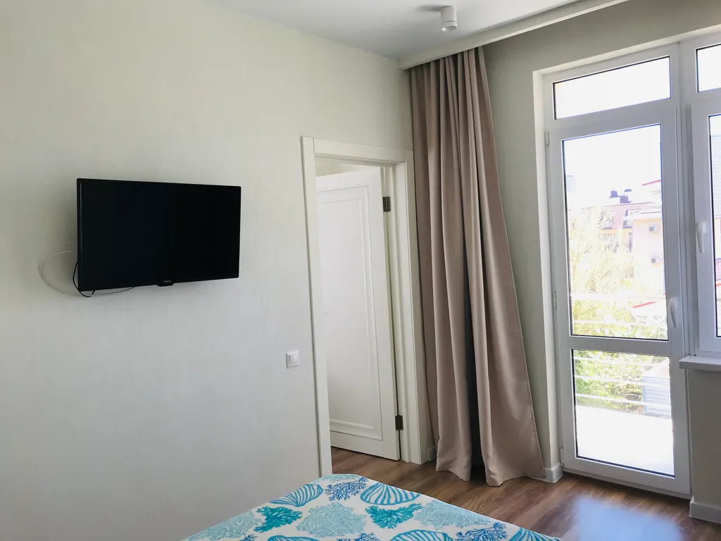 Семейные апартаменты с балконом №02 на 5 человек