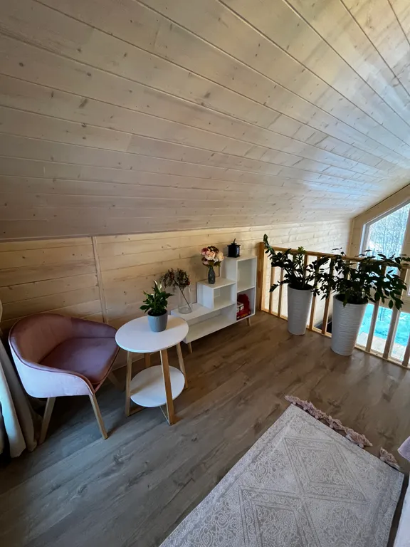 Дом с купелью на берегу реки