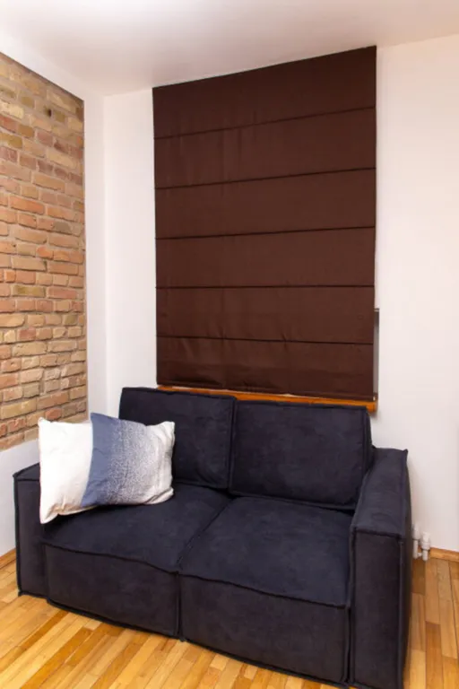 Студия Wood на булыжной мостовой от Mascaron Apartments