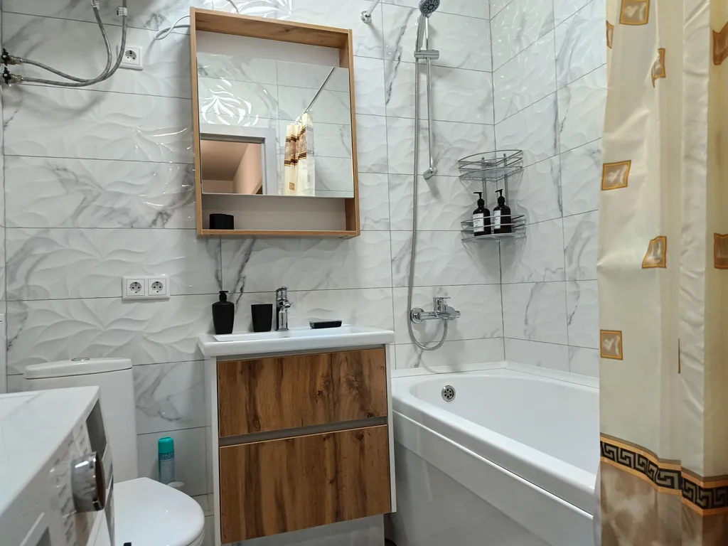 Уютная квартира в новом доме, в центре города