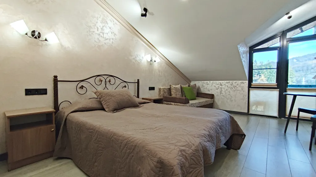 Уютная студия с балконом и красивым видом на горы