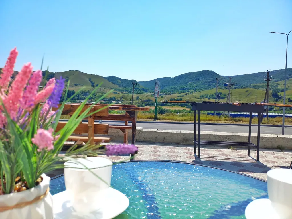 Комфортный семейный номер-студия с видом на горы