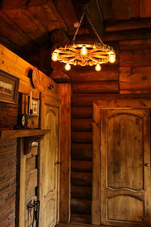 Бревенчатый дом-баня в стиле охотничьего домика