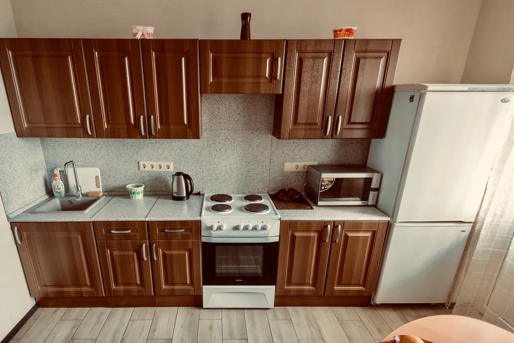 Новая квартира с большой круглой кроватью