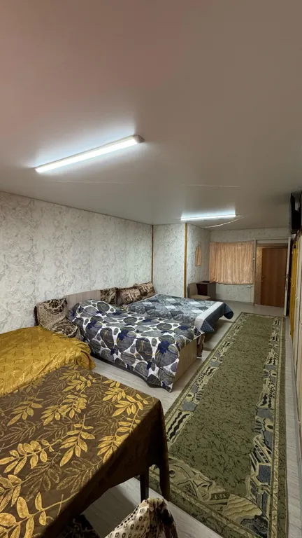 Дом-квартира с мансардой в центре